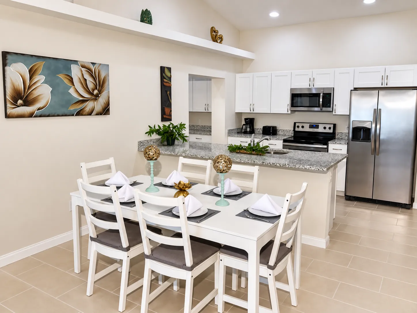 Dining room and kitchen at Love Assisted Living Facility